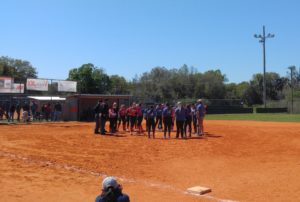 I have been assisting coaches on a girls softball team. I had to take a pic of them praying after the game. This is a city team. 